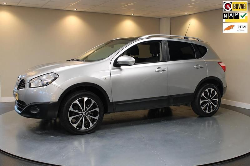 Grijs (metallic) Gebruikt 2012 Nissan Qashqai SUV | € 7.440 (Goede deal) - Afbeelding 1/4