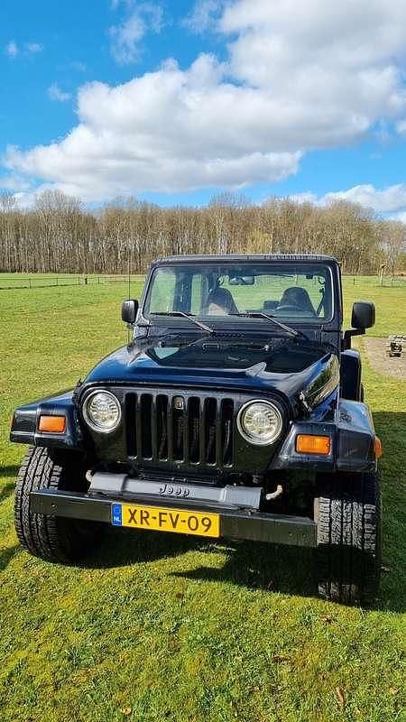 Zwart Gebruikt 1999 Jeep Wrangler SUV | € 14.950 - Afbeelding 1/4