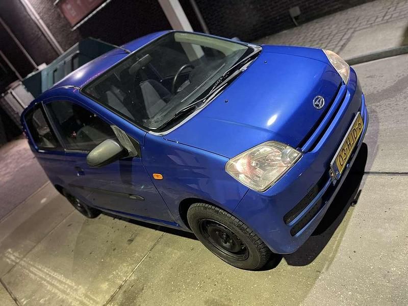 Occasion Daihatsu Cuore 58 PK (42 kW) 2009 Blauw Hatchback