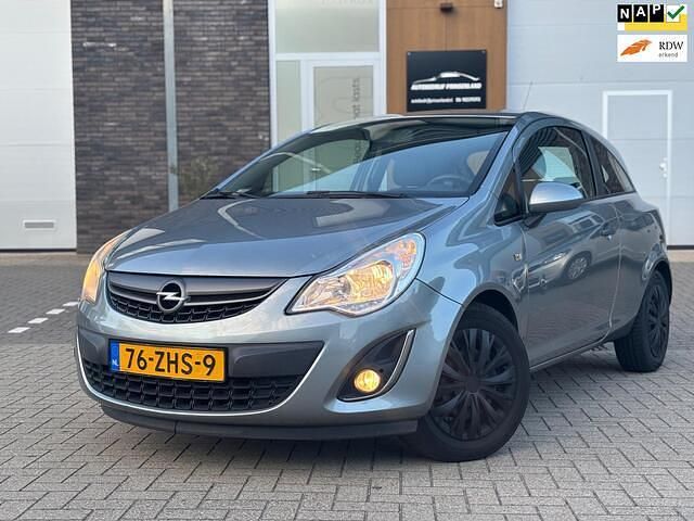 Grijs Gebruikt 2012 Opel Corsa Edition Hatchback | € 1.650 (Goede deal) - Afbeelding 1/4