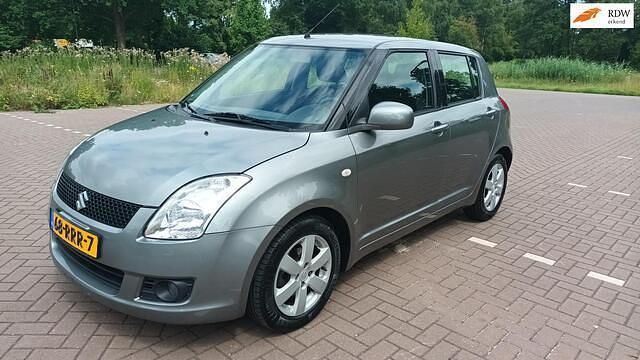 Grijs Gebruikt 2009 Suzuki Swift Hatchback | € 7.950 (Iets duurder) - Afbeelding 1/4