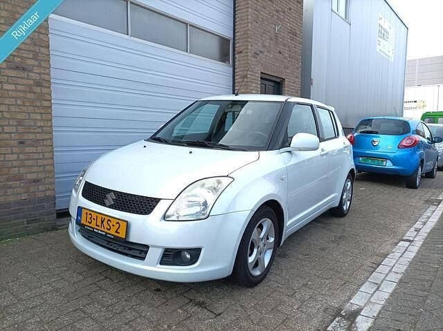 Wit Occasion 2010 Suzuki Swift Exclusive Hatchback | € 6.495 (Iets duurder) - Afbeelding 1/4