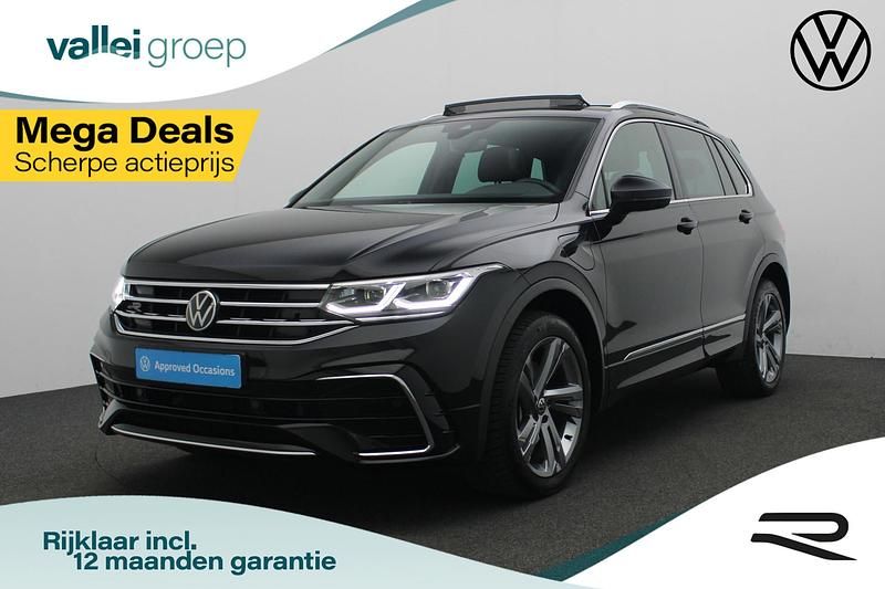 Zwart, metallic lak Gebruikt 2023 VW Tiguan Business+ SUV | € 41.900 (Eerlijke prijs) - Afbeelding 1/4