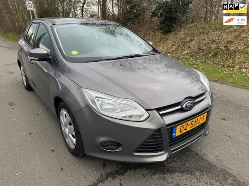 Bruin Gebruikt 2011 Ford Focus Trend Stationwagen | € 2.500 - Afbeelding 1/4