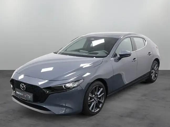 Grijs Gebruikt 2024 Mazda 3 Exclusive-Line Hatchback | € 31.450 (Eerlijke prijs) - Afbeelding 1/4