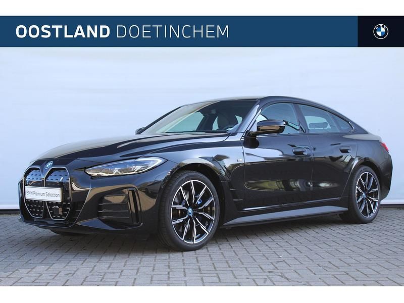 Zwart Gebruikt 2024 BMW i4 Comfort Edition Sedan | € 46.850 (Eerlijke prijs) - Afbeelding 1/3