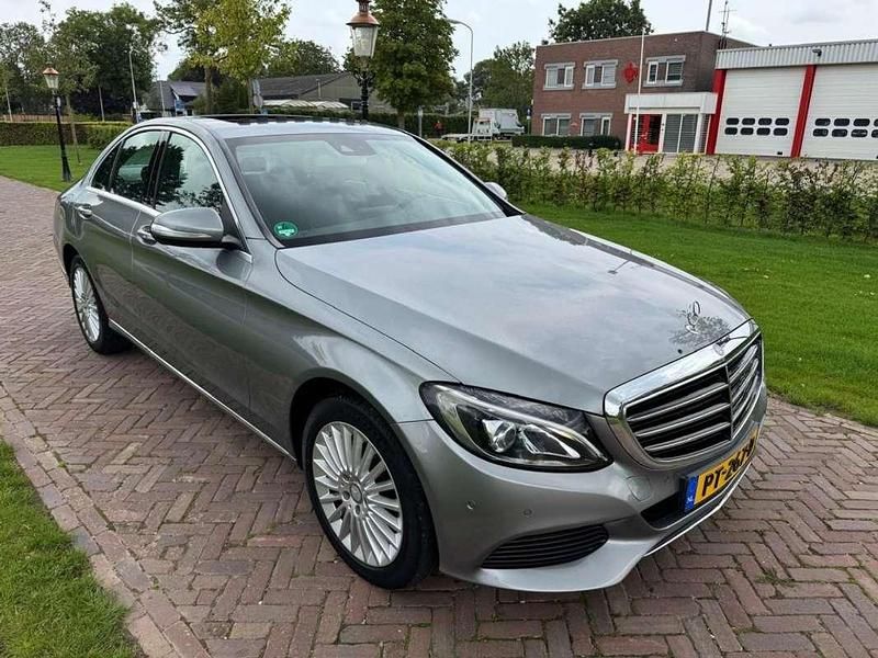 Grijs Gebruikt 2015 Mercedes C180 Sedan | € 14.950 (Goede deal) - Afbeelding 1/4