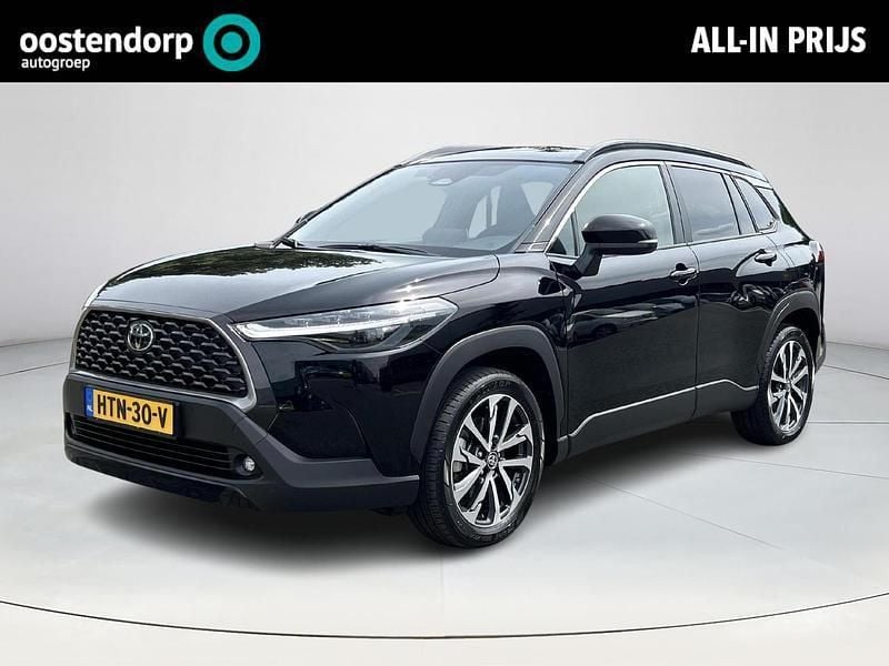Zwart Gebruikt 2024 Toyota Corolla Cross Style SUV | € 37.945 (Eerlijke prijs) - Afbeelding 1/4