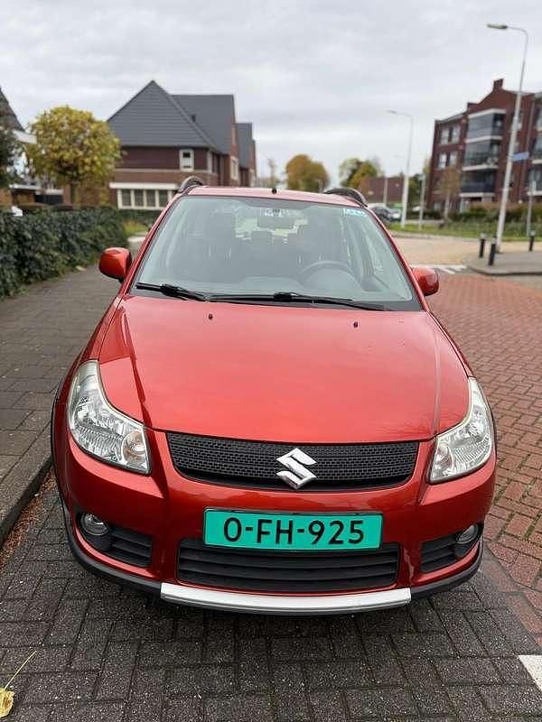 Oranje Gebruikt 2008 Suzuki SX4 Comfort Hatchback | € 4.500 (Goede deal) - Afbeelding 1/4