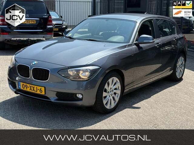 Grijs, metallic lak Gebruikt 2012 BMW 116 Hatchback | € 5.888 (Eerlijke prijs) - Afbeelding 1/4