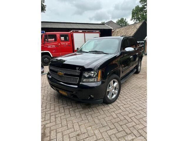 Zwart Gebruikt 2012 Chevrolet Avalanche LTZ Van | € 7.999 - Afbeelding 1/4