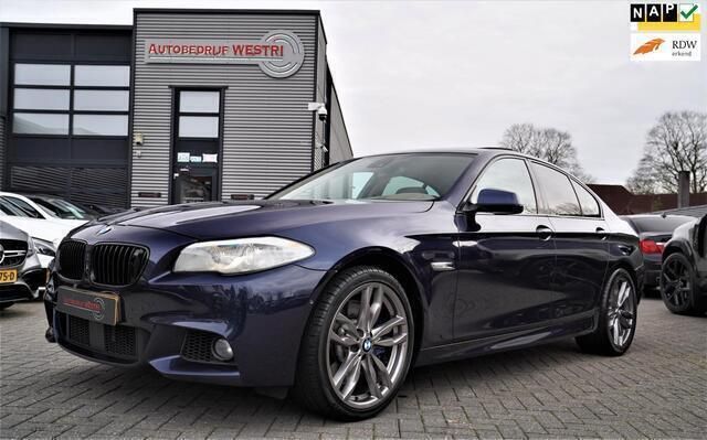 Blauw, metallic lak Gebruikt 2011 BMW 550 Executive Sedan | € 22.995 (Eerlijke prijs) - Afbeelding 1/4