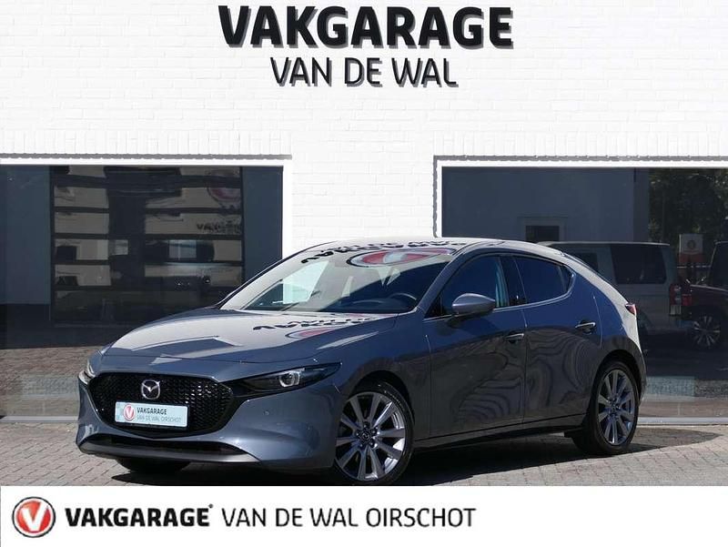Grijs Gebruikt 2024 Mazda 3 Takumi-Line Hatchback | € 31.900 (Goede deal) - Afbeelding 1/4