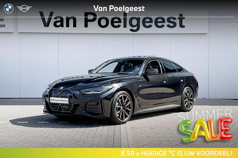 Black sapphire (donker zwart) Gebruikt 2024 BMW i4 Executive Sedan | € 48.900 (Eerlijke prijs) - Afbeelding 1/4