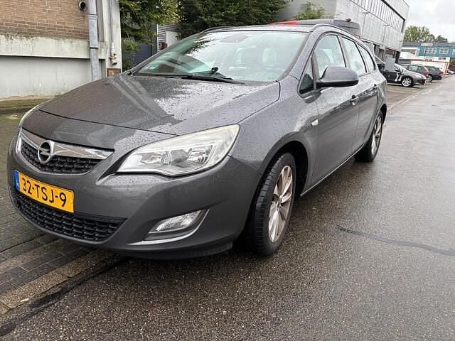 Grijs Gebruikt 2012 Opel Astra Edition Stationwagen | € 2.450 (Super prijs) - Afbeelding 1/4