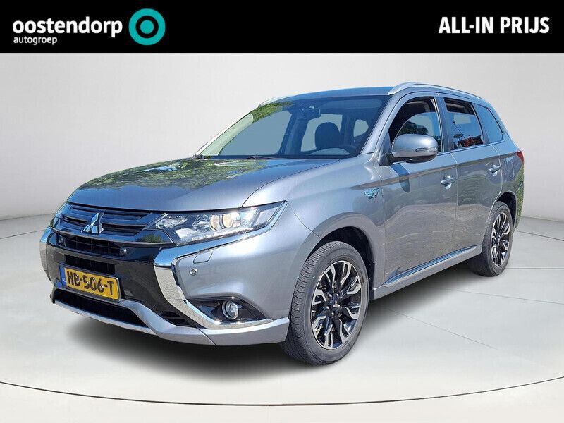 Titanium grey m grijs Gebruikt 2015 Mitsubishi Outlander P-HEV Edition SUV | € 18.445 (Iets duurder) - Afbeelding 1/4