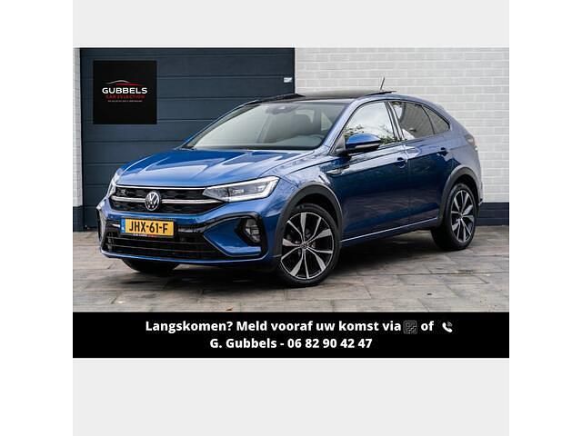 Blauw (metallic) Gebruikt 2022 VW Taigo R-line SUV | € 24.999 (Eerlijke prijs) - Afbeelding 1/4