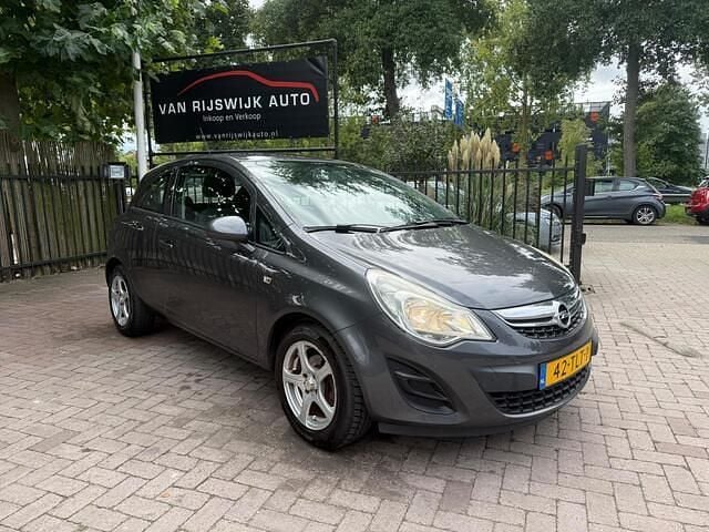 Grijs Gebruikt 2012 Opel Corsa Edition Hatchback | € 1.990 (Super prijs) - Afbeelding 1/4