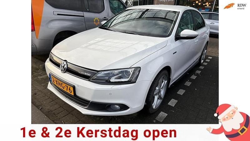 Wit Gebruikt 2013 VW Jetta Hybrid Highline Sedan | € 7.450 (Goede deal) - Afbeelding 1/4