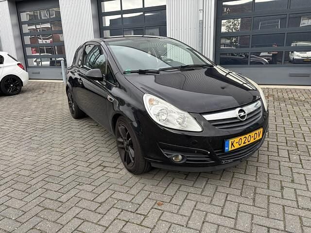 Zwart Gebruikt 2009 Opel Corsa Edition Hatchback | € 999 (Super prijs) - Afbeelding 1/3