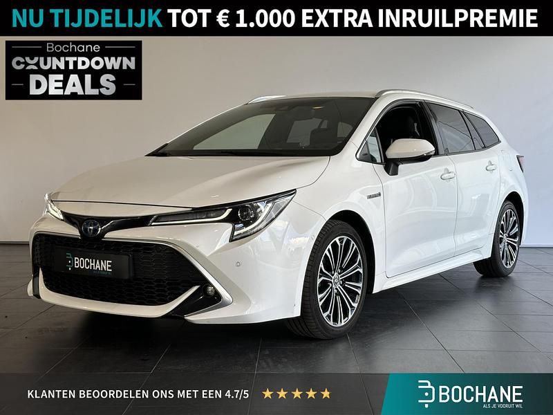 Wit Gebruikt 2021 Toyota Corolla Executive Stationwagen | € 21.645 (Goede deal) - Afbeelding 1/4
