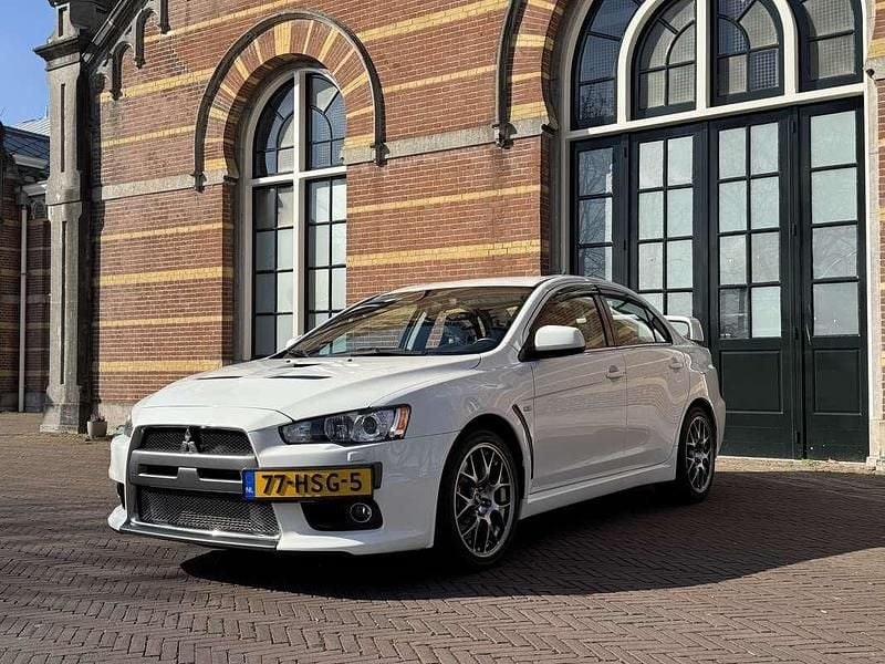 Wit Gebruikt 2009 Mitsubishi Lancer Sedan | € 41.995 - Afbeelding 1/4