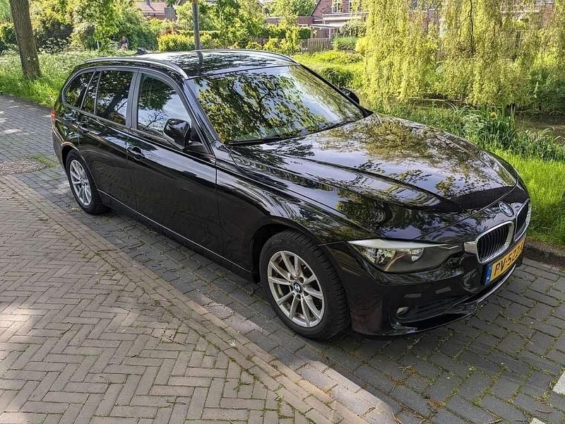 Zwart Gebruikt 2014 BMW 316 Executive Stationwagen | € 6.499 (Goede deal) - Afbeelding 1/4