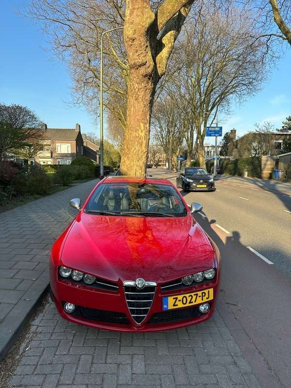Rood Gebruikt 2009 Alfa Romeo 159 Distinctive Sedan | € 14.950 - Afbeelding 1/4