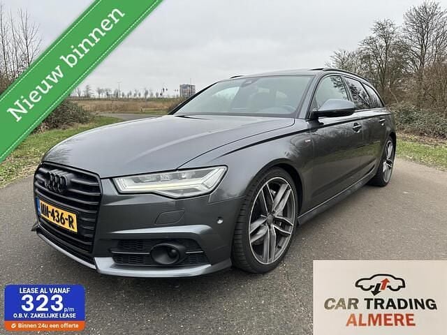 Grijs (metallic) Occasion 2016 Audi A6 Premium Stationwagen | € 18.950 (Iets duurder) - Afbeelding 1/4