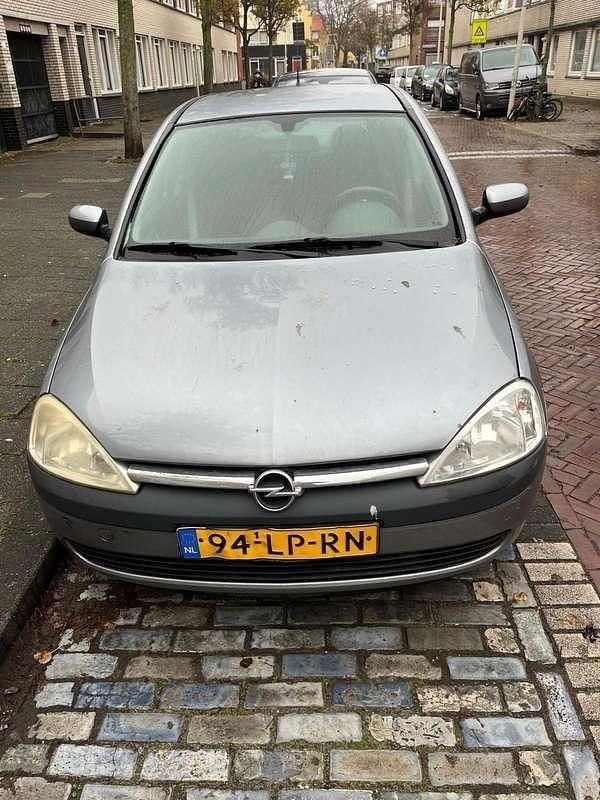 Grijs Gebruikt 2003 Opel Corsa Njoy Hatchback | € 650 (Goede deal) - Afbeelding 1/4
