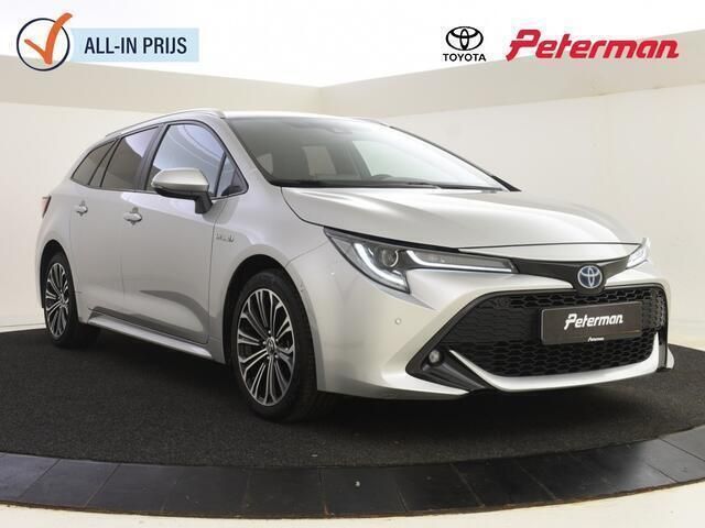 Grijs, metallic lak Gebruikt 2019 Toyota Corolla Style Stationwagen | € 21.999 (Eerlijke prijs) - Afbeelding 1/4