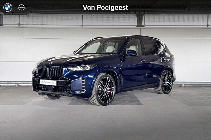 Tansanitblau metallic (blauw metallic) Gebruikt 2024 BMW X5 Performance SUV | € 114.900 (Duur) - Afbeelding 1/4