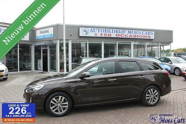Bruin Gebruikt 2018 Hyundai i30 Premium Stationwagen | € 12.950 (Eerlijke prijs) - Afbeelding 1/4