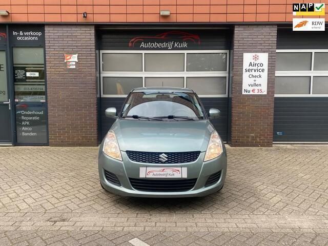 Groen, metallic lak Gebruikt 2014 Suzuki Swift Hatchback | € 9.650 (Eerlijke prijs) - Afbeelding 1/4