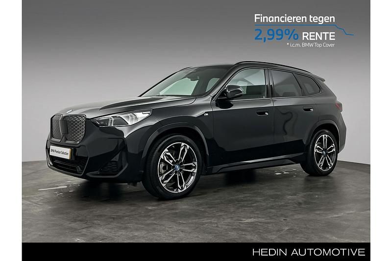 Zwart Gebruikt 2024 BMW iX1 Comfort Edition SUV | € 48.880 (Goede deal) - Afbeelding 1/4