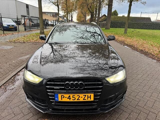 Zwart Gebruikt 2015 Audi A4 Sport Stationwagen | € 7.499 - Afbeelding 1/4