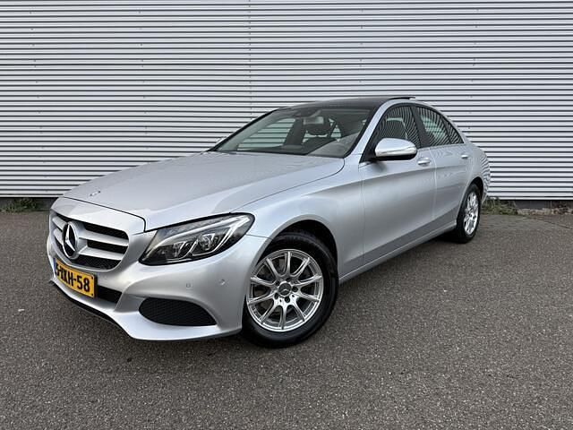 Grijs (metallic) Occasion 2014 Mercedes C180 Sedan | € 11.950 (Eerlijke prijs) - Afbeelding 1/4