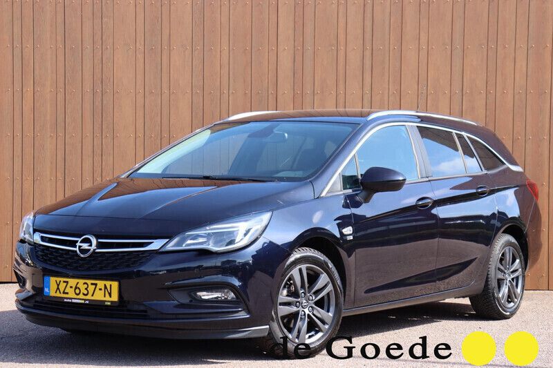 Blauw, metallic lak Gebruikt 2019 Opel Astra Edition Stationwagen | € 10.940 (Eerlijke prijs) - Afbeelding 1/4
