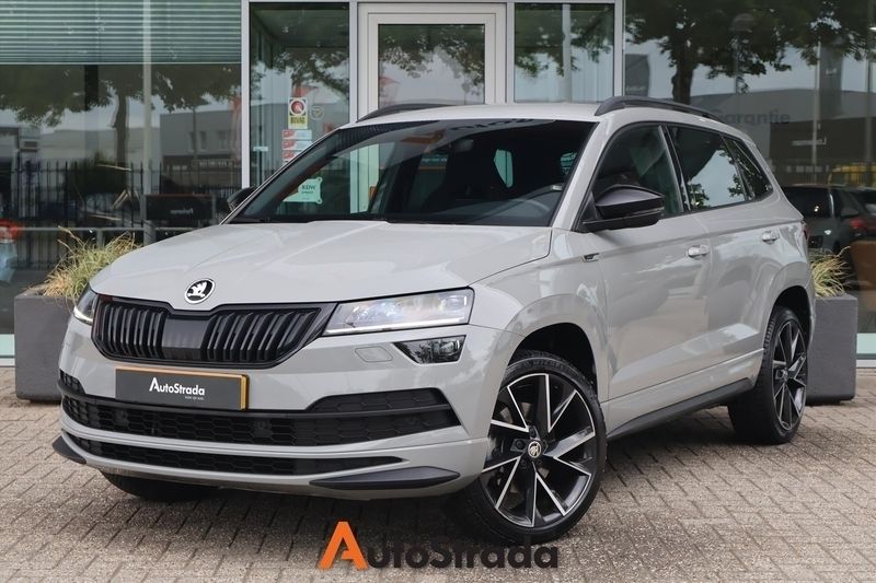 Grijs Gebruikt 2021 Skoda Karoq SportLine SUV | € 28.700 (Eerlijke prijs) - Afbeelding 1/4