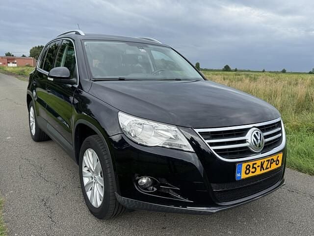 Zwart Gebruikt 2010 VW Tiguan Sport SUV | € 5.950 (Eerlijke prijs) - Afbeelding 1/4