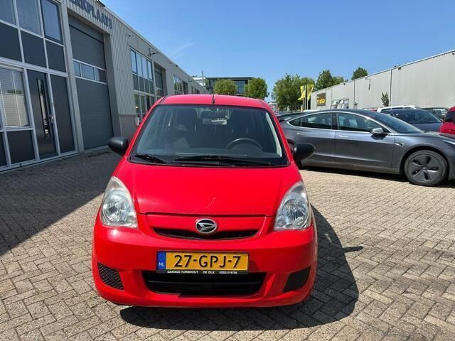 Occasion Daihatsu Cuore 69 PK (50 kW) 2008 Rood Hatchback