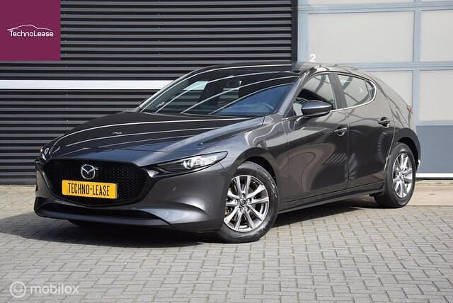 Grijs Gebruikt 2021 Mazda 3 Comfort Hatchback | € 20.750 (Eerlijke prijs) - Afbeelding 1/4