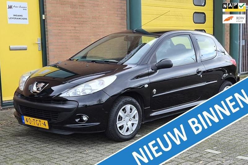 Zwart (metallic) Gebruikt 2012 Peugeot 206 Urban Move Hatchback | € 2.950 - Afbeelding 1/4