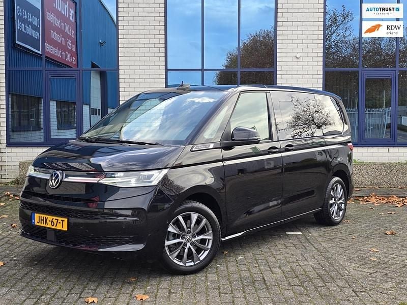 Zwart Gebruikt 2022 VW Multivan Business Van | € 44.950 (Goede deal) - Afbeelding 1/4