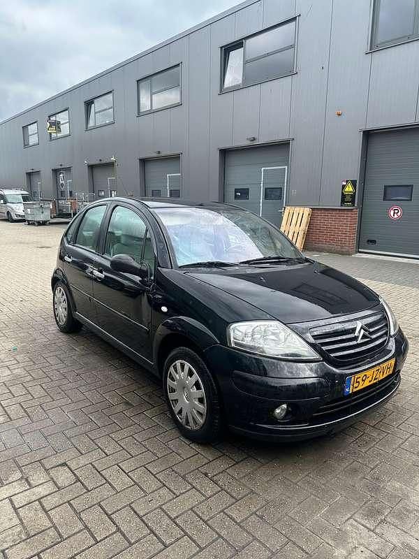 Zwart Gebruikt 2002 Citroën C3 Exclusive Hatchback | € 800 (Eerlijke prijs) - Afbeelding 1/4