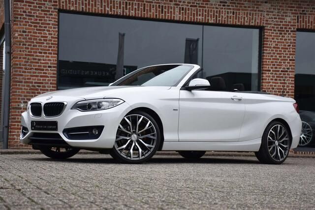 Wit Gebruikt 2016 BMW 218 Sport Line Cabriolet | € 18.450 (Eerlijke prijs) - Afbeelding 1/4