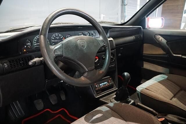 Occasion Lancia Delta 139 PK (102 kW) 1996 Rood Hatchback