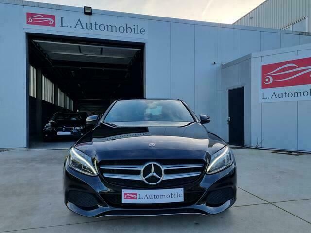 Zwart Gebruikt 2018 Mercedes C180 AMG line Sedan | € 23.950 (Eerlijke prijs) - Afbeelding 1/4