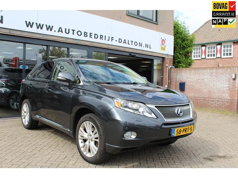 Grijs Gebruikt 2011 Lexus RX450h SUV | € 14.950 (Goede deal) - Afbeelding 1/4