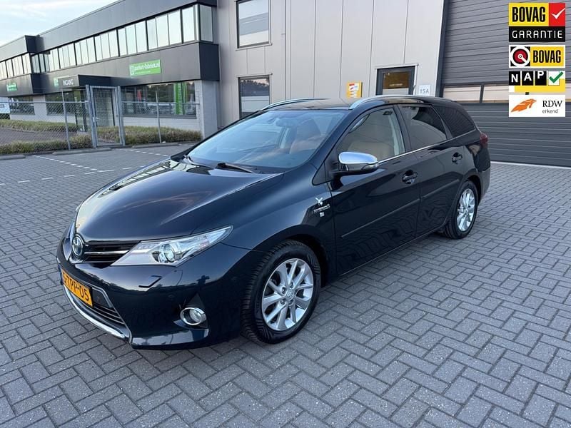 Grijs Gebruikt 2014 Toyota Auris Hybrid Stationwagen | € 9.999 (Goede deal) - Afbeelding 1/4